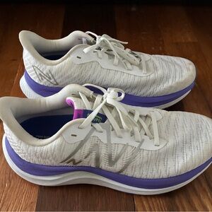 Women's White and Purple New Balance fuel cell propel